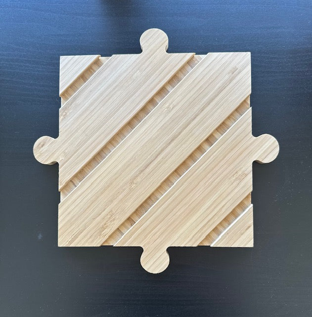 plyboo puzzle piece on a table